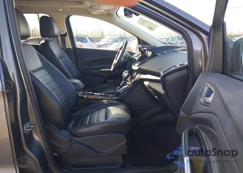 2014 Ford Escape Titanium z USA, uszkodzony, nr VIN 1FMCU9J94EUE34792